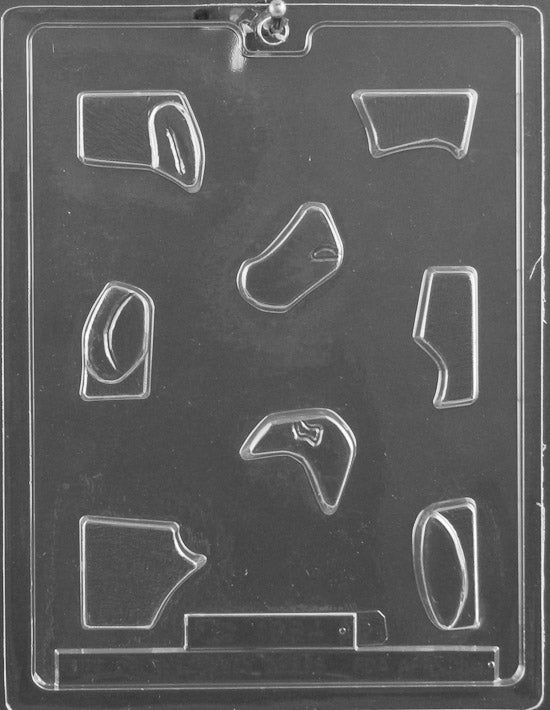 Plastic chocolate mold featuring interlocking puzzle pieces shaped to form part of a bunny.