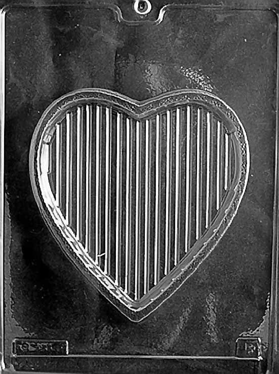 Clear plastic mold featuring a large heart shape with vertical grooves, crafted to form the base of a chocolate pour box.