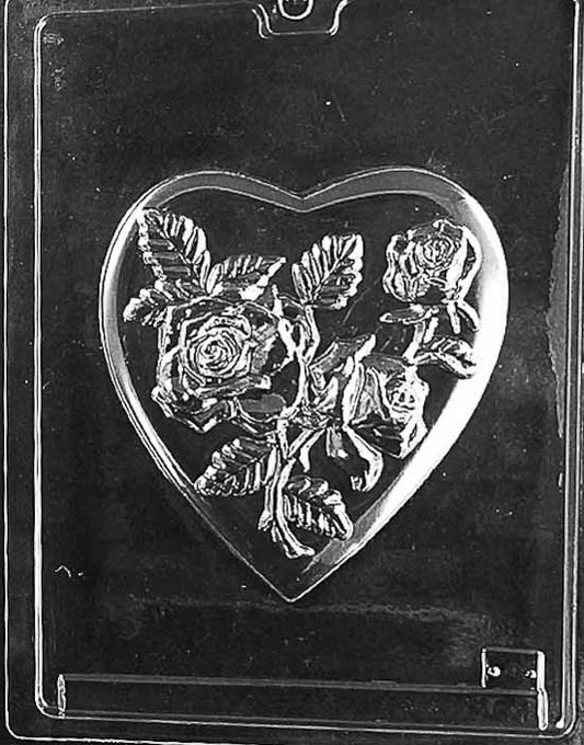 Clear plastic chocolate mold with a heart shape embossed with a detailed rose bouquet and leaves, designed for use as the lid of a chocolate pour box.