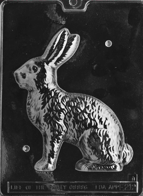 Chocolate mold showing the left half of a sitting bunny with textured fur and perked ears.
