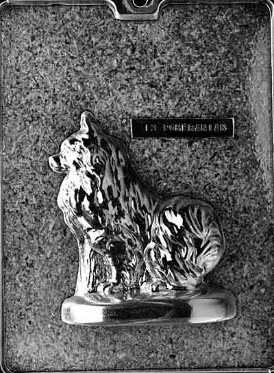 Clear plastic chocolate mold showing the matching back half of a seated Pomeranian with fluffy hindquarters and tail texture, designed to pair with the front half for a complete 3D figure.