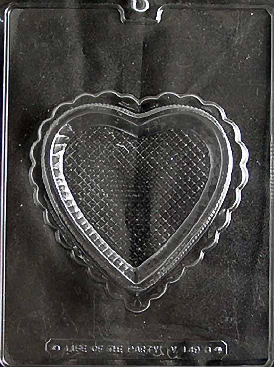 Clear plastic mold featuring a heart-shaped chocolate box base with a scalloped edge and textured crosshatch pattern inside.