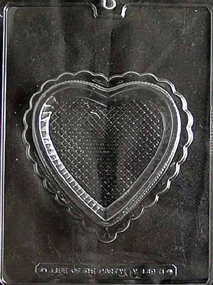 Clear plastic mold featuring a heart-shaped chocolate box base with a scalloped edge and textured crosshatch pattern inside.