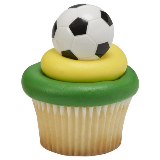 Vanilla cupcake with green and yellow frosting topped with a 3D soccer ball ring.