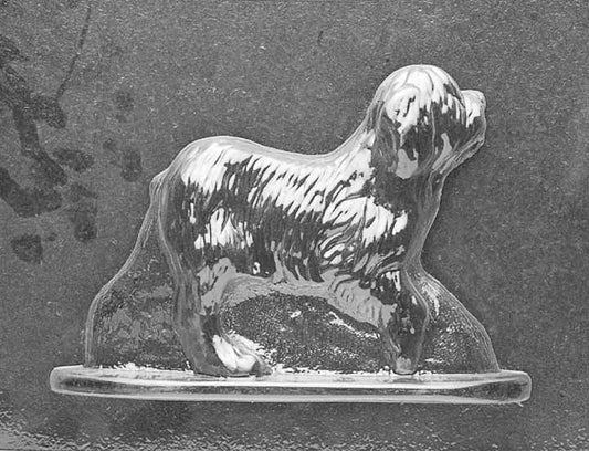 Clear plastic chocolate mold showing the matching back half of an Old English Sheepdog with continued coat texture and rear leg and tail detailing, designed to pair for a 3D figure.
