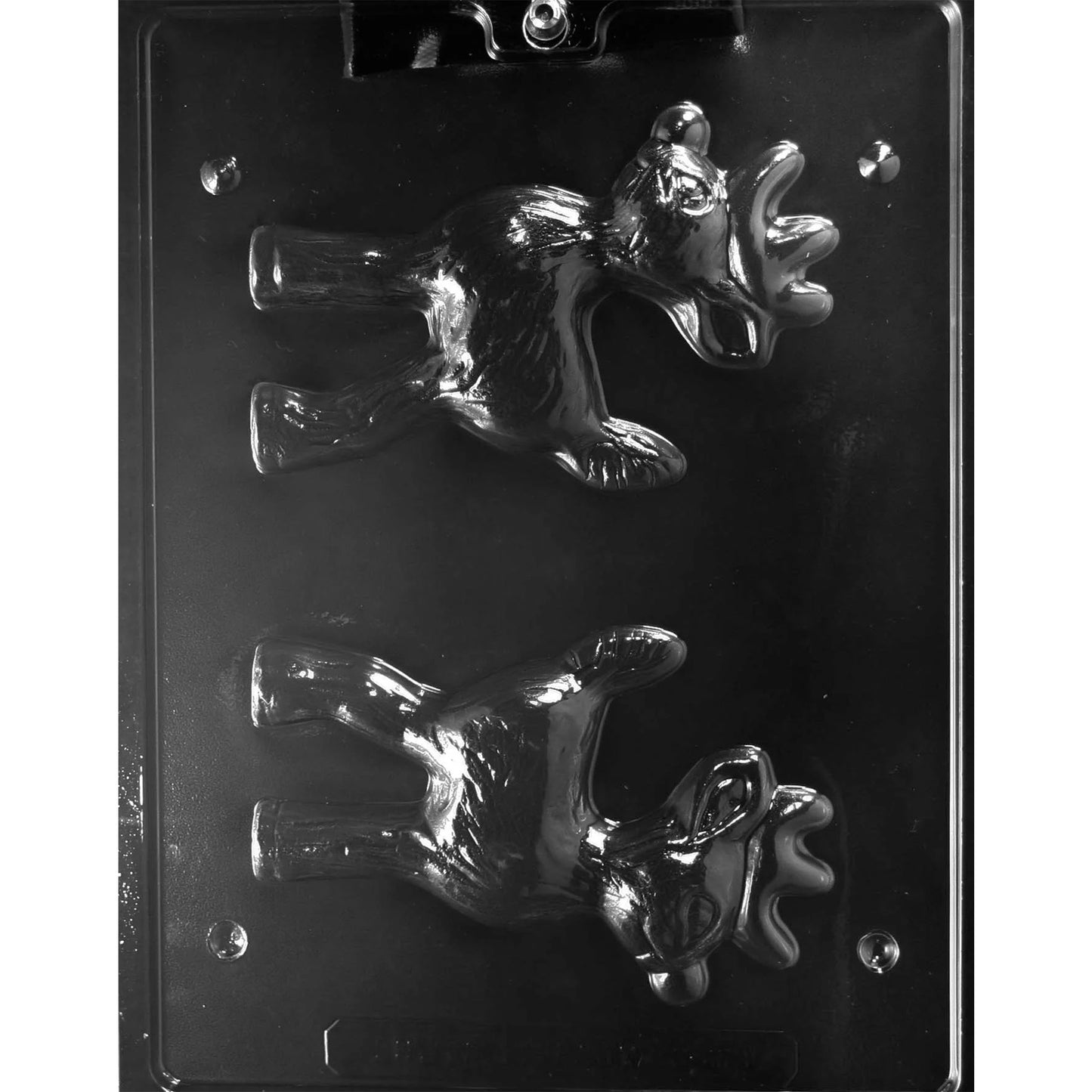 Clear plastic 3D chocolate mold photographed on a dark background with two reindeer halves, showing a standing reindeer with antlers, legs, and a rounded nose.