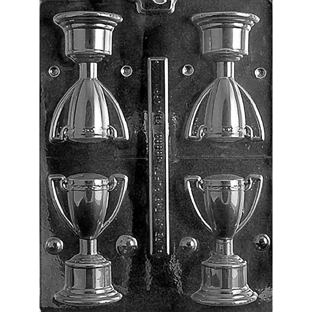 Four-cavity 3D chocolate trophy mold with defined cups, curved handles, stems, and pedestal bases measuring approximately 3 3/4 x 2 3/8 x 1 7/8 inches
