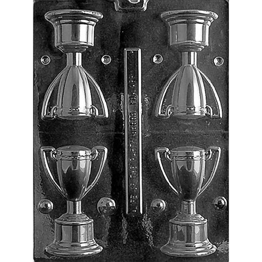 Four-cavity 3D chocolate trophy mold with defined cups, curved handles, stems, and pedestal bases measuring approximately 3 3/4 x 2 3/8 x 1 7/8 inches