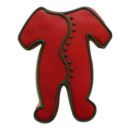 Festive cookie in the shape of footie pajamas decorated in red icing with green piping and buttons.