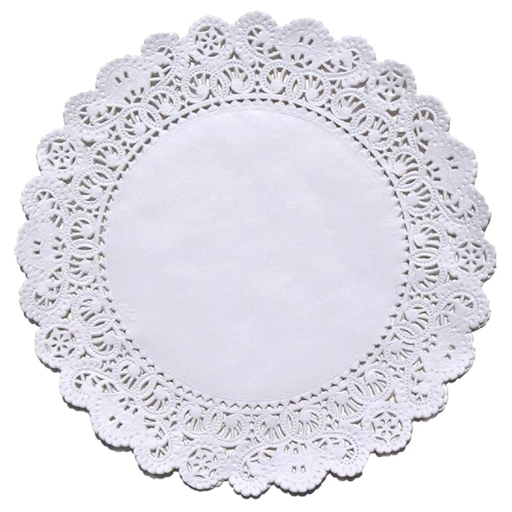 4 inch white paper lace doily with scalloped edge and detailed cutouts, photographed flat on a white background.
