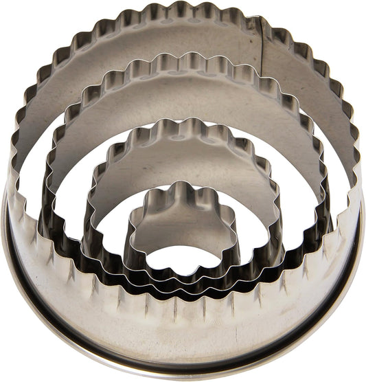 Nested View of Ateco 4-piece stainless steel fluted round cutter set, designed for precise cutting of cookies, fondant, and pastries with a decorative edge.