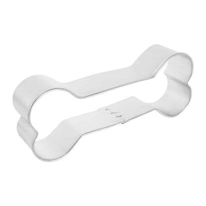 Side view of a dog bone cookie cutter showing its depth and sturdy construction.