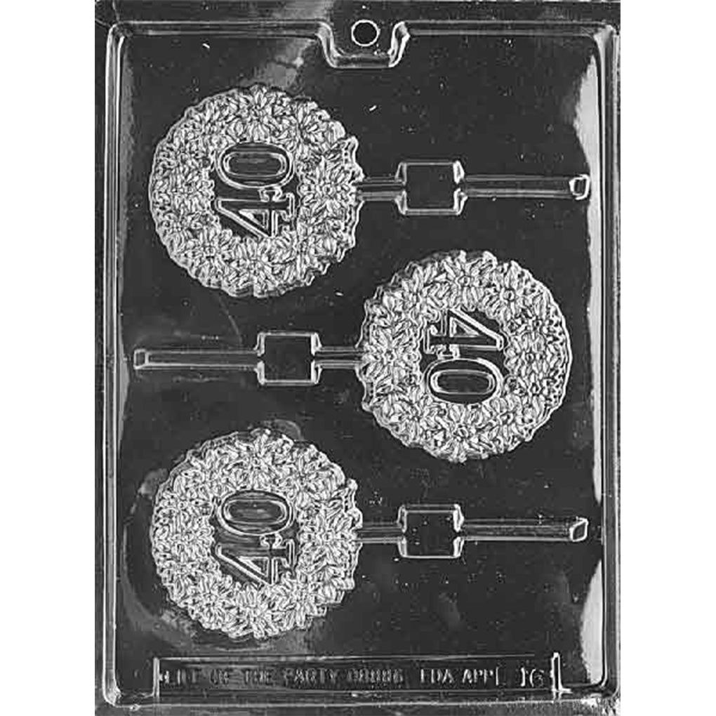 Clear 40th Chocolate Lollipop Mold photographed against a black background with three round cavities featuring raised 40 numerals surrounded by textured wreath-style borders.