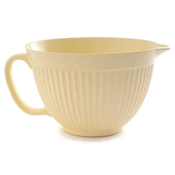 Cream-colored melamine mixing bowl with handle, non-slip bottom, textured exterior, and spout for easy pouring.