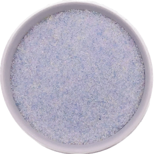 Opal fine sanding sugar in a clear container, translucent crystals with iridescent shimmer and a pearl-like effect.