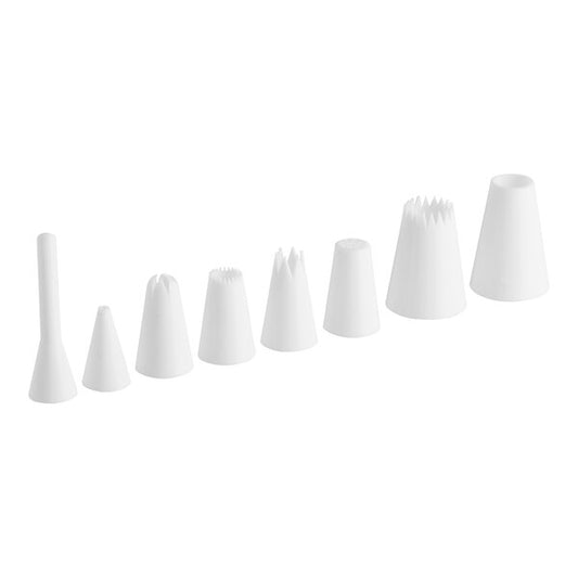 Set of 8 white plastic piping tips arranged in a row, showcasing different shapes and sizes for cake decorating.