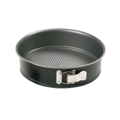 Black 8-inch nonstick springform pan with textured removable base, tall round sides, and a silver spring latch shown on a white background.
