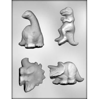 Clear plastic candy mold with four dinosaur shapes, including T-Rex, Brontosaurus, Stegosaurus, and Triceratops.