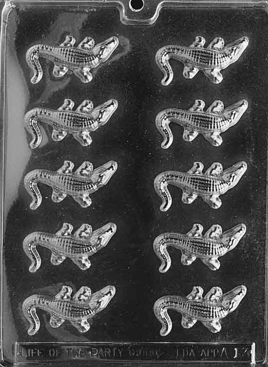 Sheet of small alligator shapes with ridged backs and defined snouts.