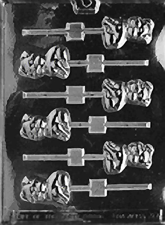 Lollipop mold of a small pig with snout and ear details.