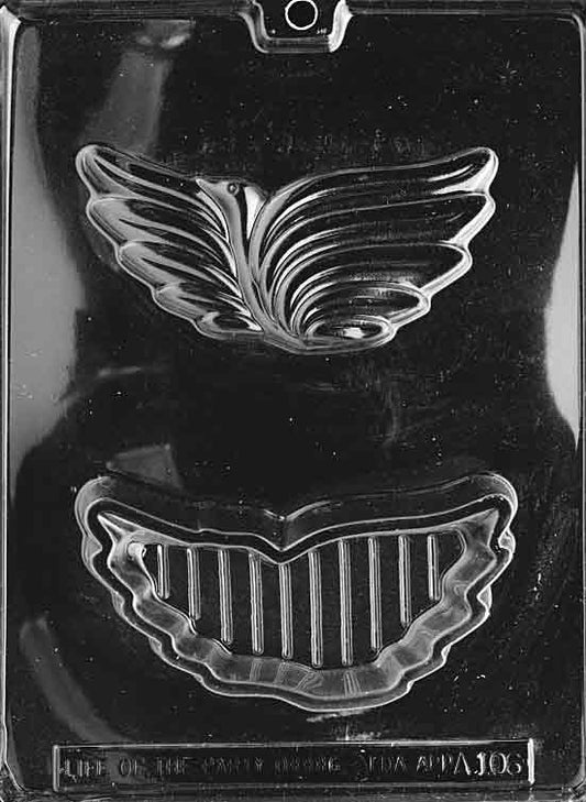Pour box mold forming a streamlined bird with outstretched wings and hollow interior.