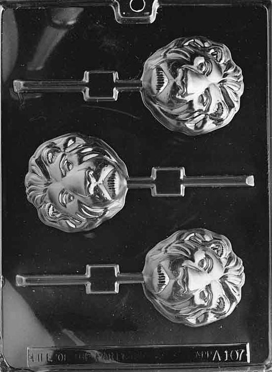 Round lion face lollipop cavity with layered mane and smiling features.