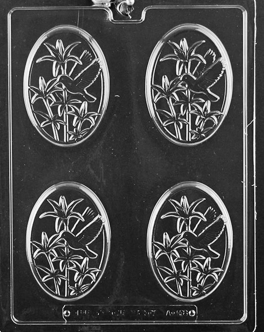 Oval/rectangular plaque cavity featuring a hummingbird in relief with floral texture.