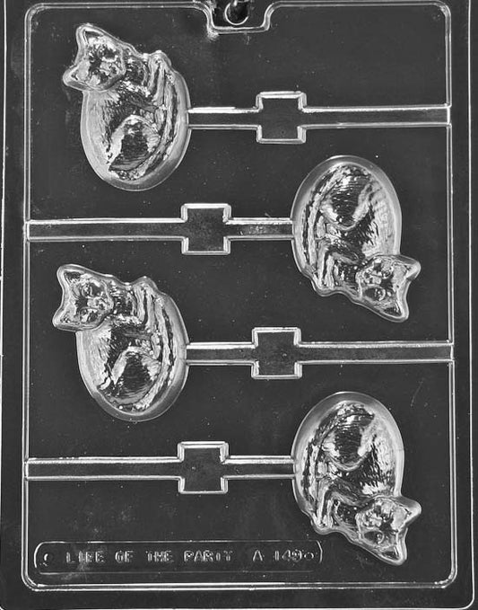 Lollipop cavities of a cat face with pointed ears and smile lines; stick channels included.