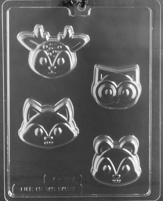 Mold sheet with four thicker cavities: deer, owl, fox, squirrel; rounded cookie-style depth with crisp facial lines.