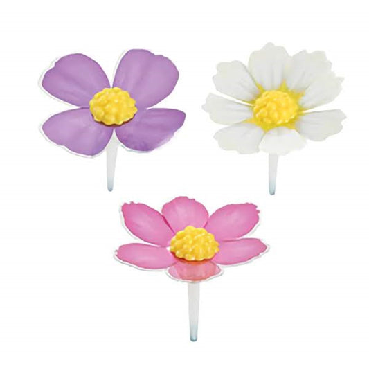 A set of three-dimensional flower picks, crafted from acetate for a glass-like sheen. Each flower, in shades of purple, pink, and white, features a realistic yellow center. These picks are perfect for adding a touch of floral elegance to cupcakes or to adorn a spring-themed cake.
