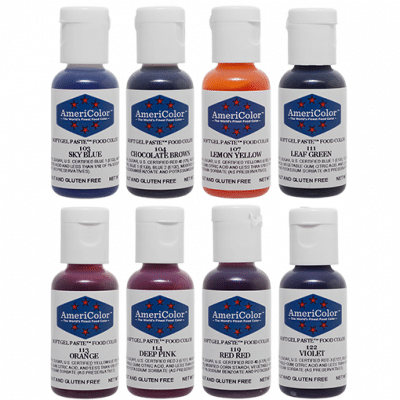 Eight AmeriColor Soft Gel Paste bottles from the Junior Kit in Sky Blue, Chocolate Brown, Lemon Yellow, Leaf Green, Orange, Deep Pink, Red Red, and Violet.