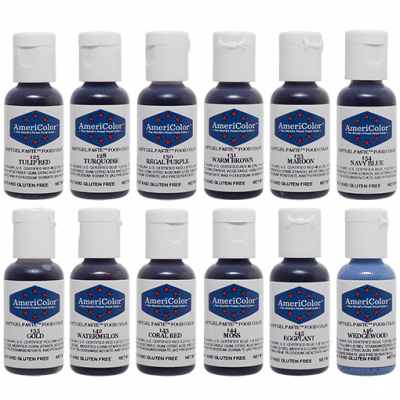Lineup of 12 AmeriColor Soft Gel Paste bottles from the Student Kit in assorted shades.