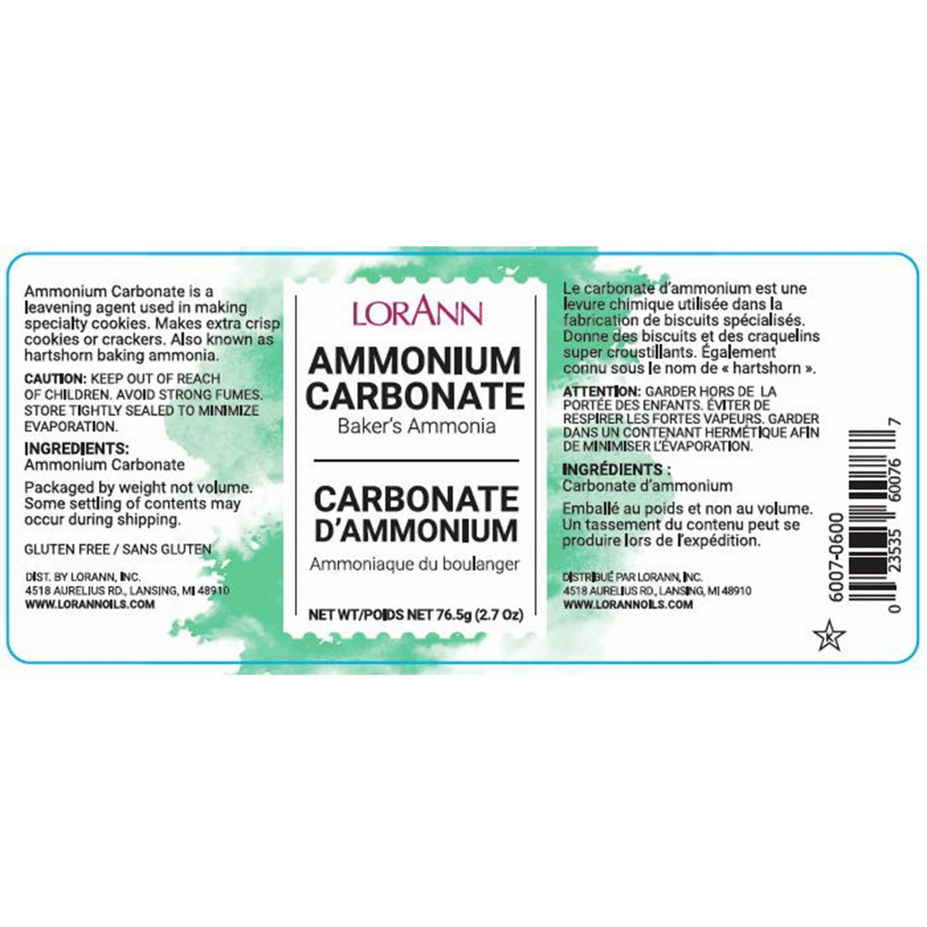 LorAnn Ammonium Carbonate label close-up with green watercolor-style background, ingredient and caution text, and net weight 2.7 oz.