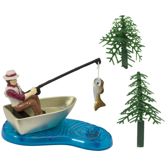 Fisherman cake topper set with rowboat, fish on a fishing line, and two plastic pine trees