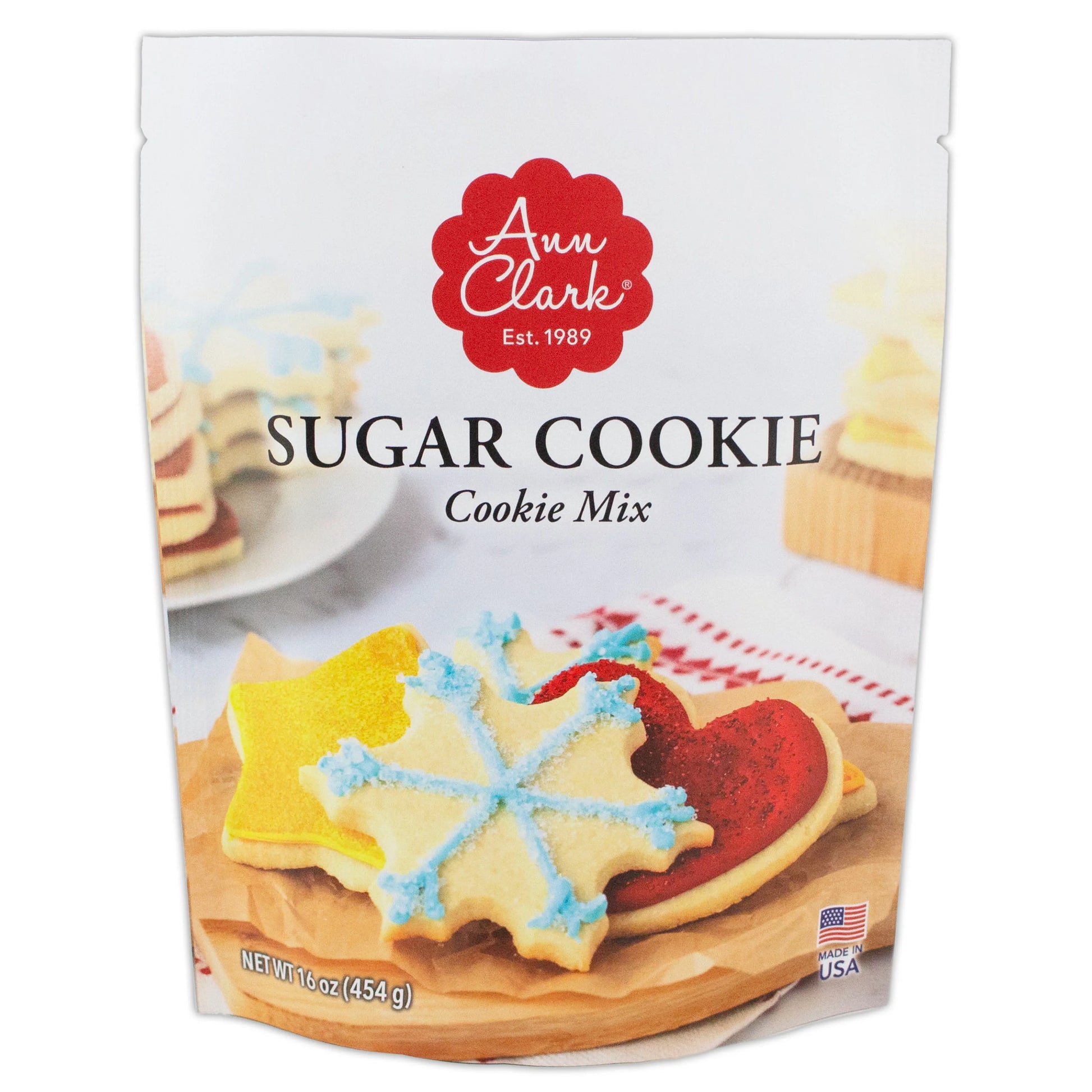 Front of Ann Clark Sugar Cookie Mix package showing decorated holiday cookies in star, heart, and snowflake shapes with colorful icing and sugar.