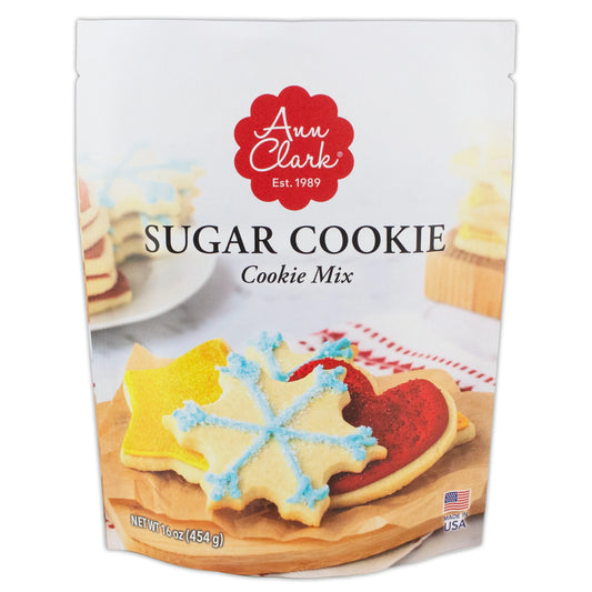 Front of Ann Clark Sugar Cookie Mix package showing decorated holiday cookies in star, heart, and snowflake shapes with colorful icing and sugar.