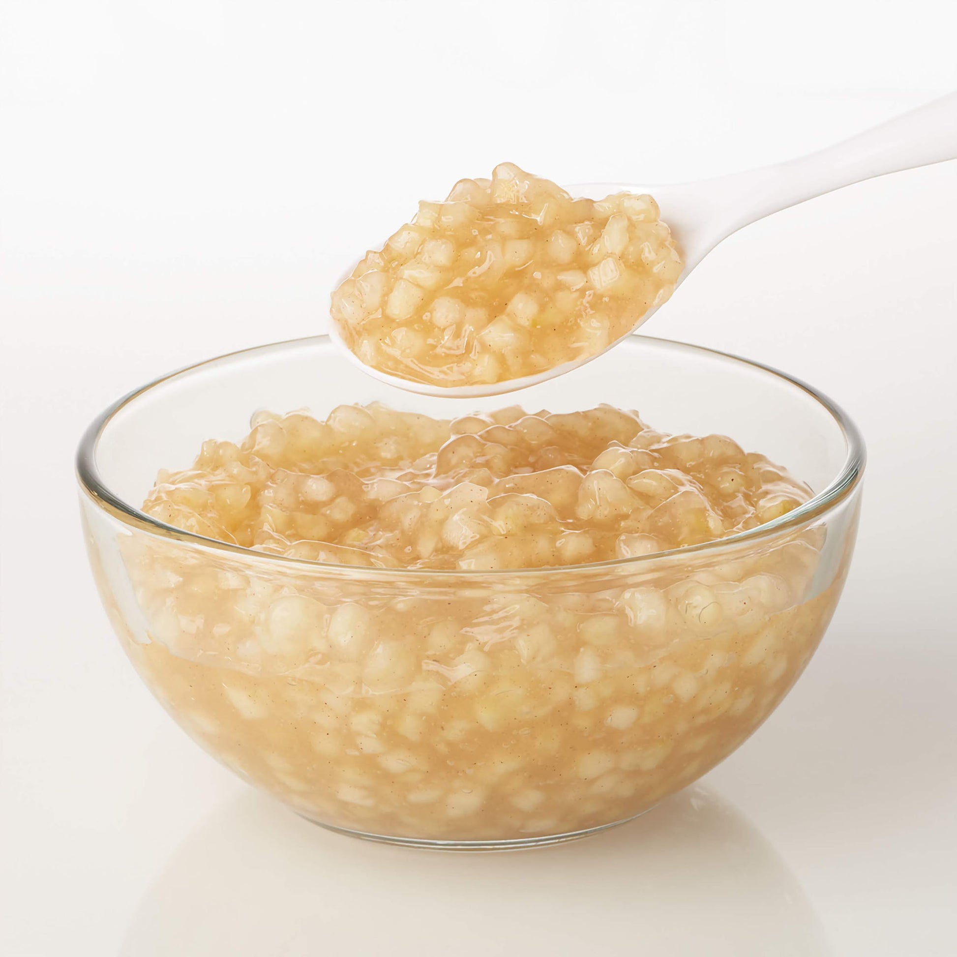 Classic apple cake and pastry filling, ready to use in sealed packaging, contains tender apple pieces enrobed in a cinnamon-spiced syrup, ready to be used in creating homestyle apple pies or Danish pastries.