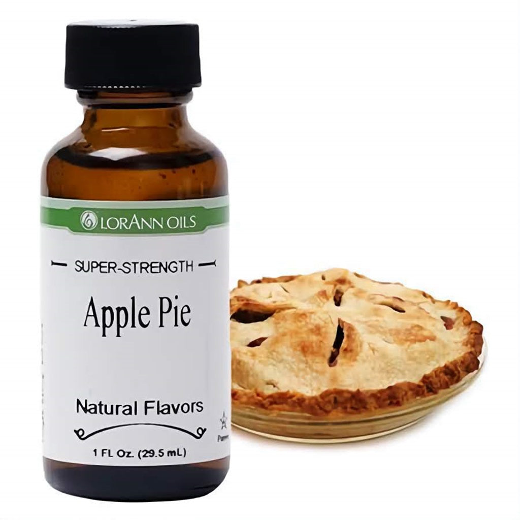 LorAnn Oils Super Strength Apple Pie Flavor in a 1 fl oz bottle, placed beside a golden-brown baked apple pie, showcasing the intended dessert flavoring.