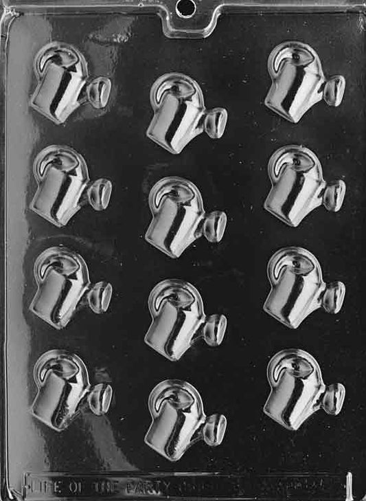 Clear mold with small rectangular and motif cavities for baby shower mints; smooth embossed detail.