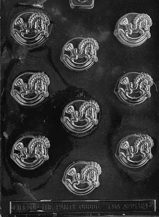 Clear mold with round cavity featuring a raised rocking horse; moderate depth for fillings.