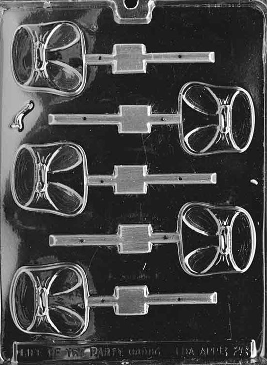 Clear lollipop mold with small square diaper design; tab edges and fold emboss visible; stick channel.