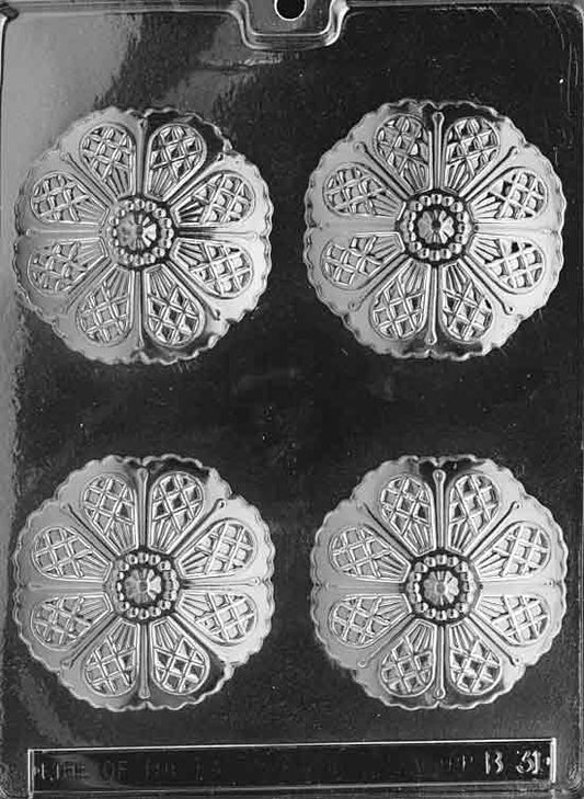 Clear mold with larger round umbrella-top cavities; ribbed segments visible; shallow dome.