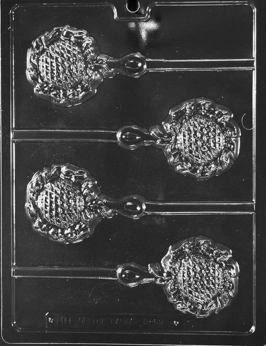 Clear lollipop mold of a baby rattle; circular top, narrow handle, and defined band; glossy plastic on white.