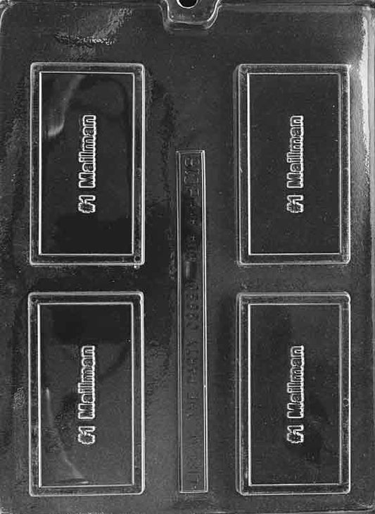 Clear card-size mold showing “#1 MAILMAN” in raised letters; rectangular plaque; smooth frame; white backdrop.