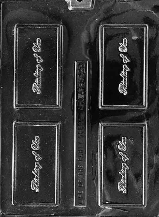Clear rectangular mold with “THINKING OF YOU” raised lettering; business-card size; smooth edges.