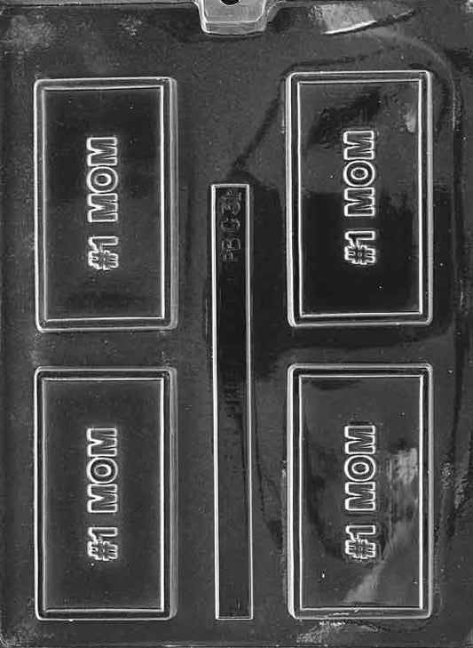 Clear rectangular chocolate mold with “#1 MOM” raised letters; smooth face and framed edge.