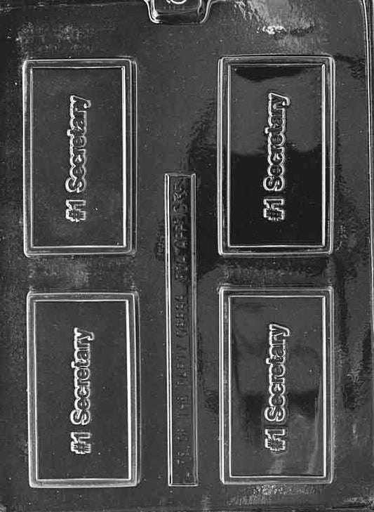Clear rectangular mold with “#1 SECRETARY” in raised letters; proportions as noted; slim border.