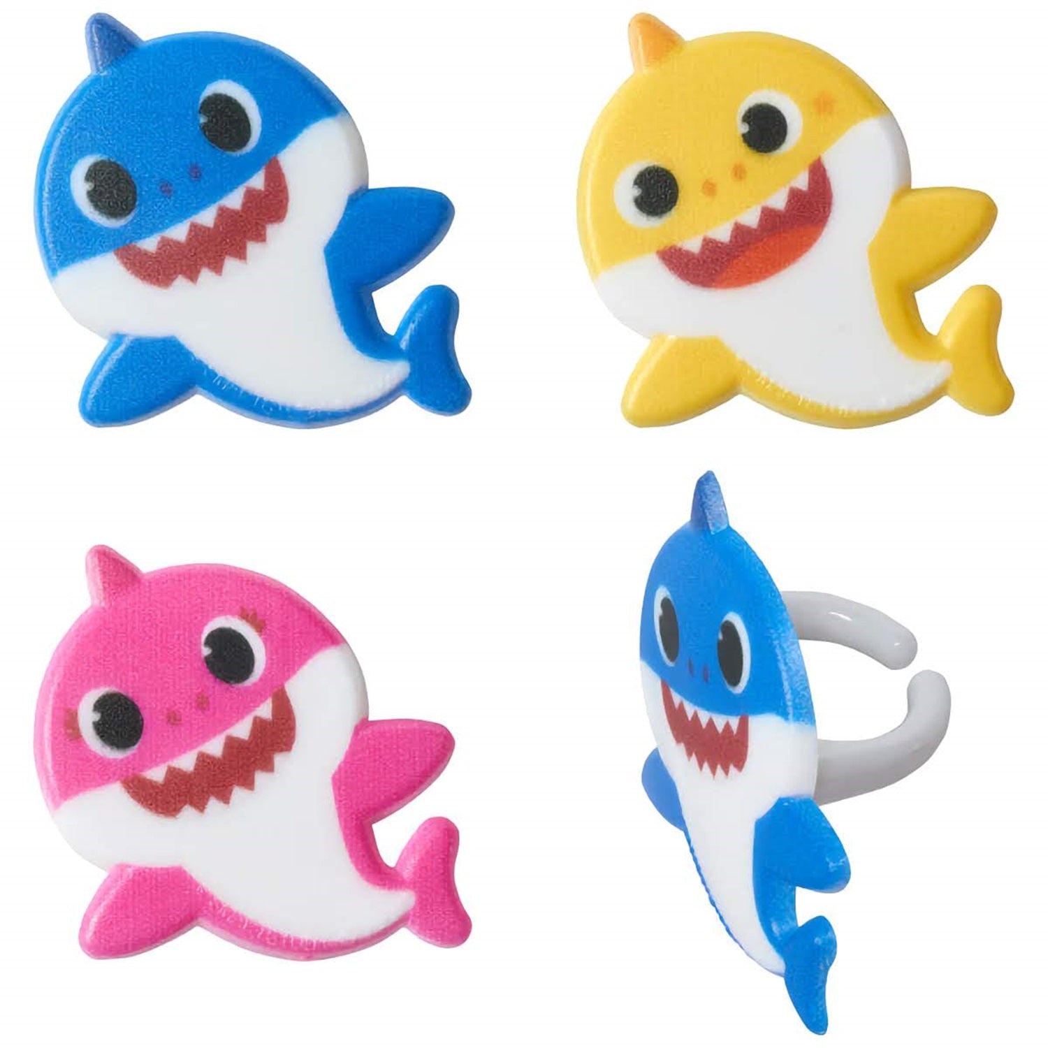 Close-up of Baby Shark-themed cupcake rings in blue, pink, and yellow, showing both the front design and back ring attachment.