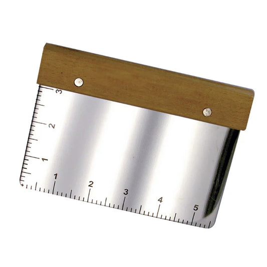 Stainless steel kitchen bench scraper with a light brown wooden handle and printed ruler markings along the bottom and left edges, shown on a white background.
