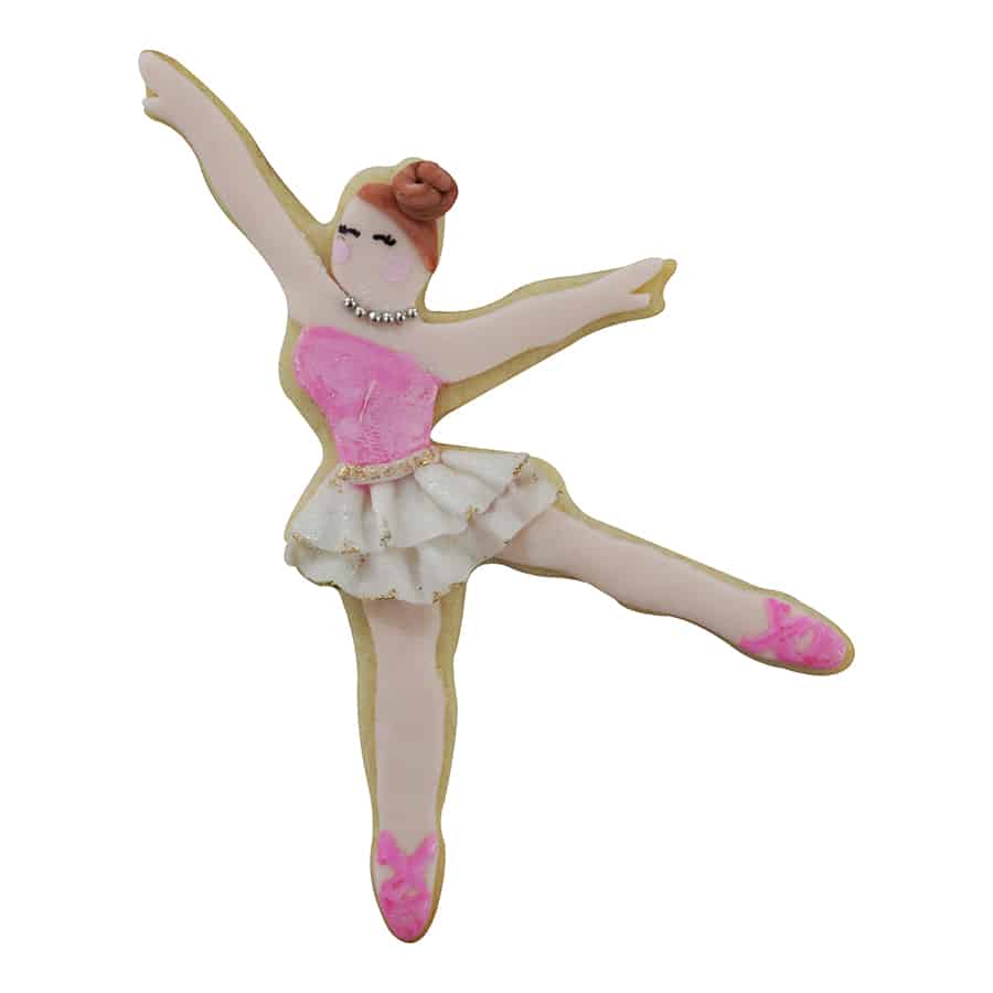 Decorated ballerina-shaped cookie with pink leotard, tutu, and ballet shoes, made using a ballerina cookie cutter.